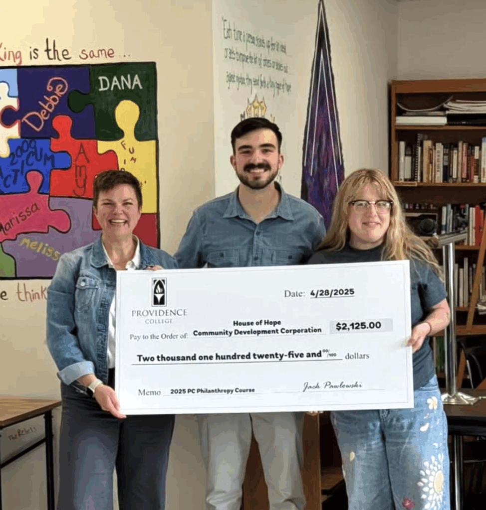 Jack presenting a check to House of Hope